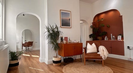 Mantra's tranquil interior, featuring cozy seating and pastel decor in Leeds, England, GB.