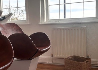 Comfortable seating at Mantra Studio, Leeds, England, GB in a sunlit corner for a tranquil experience.