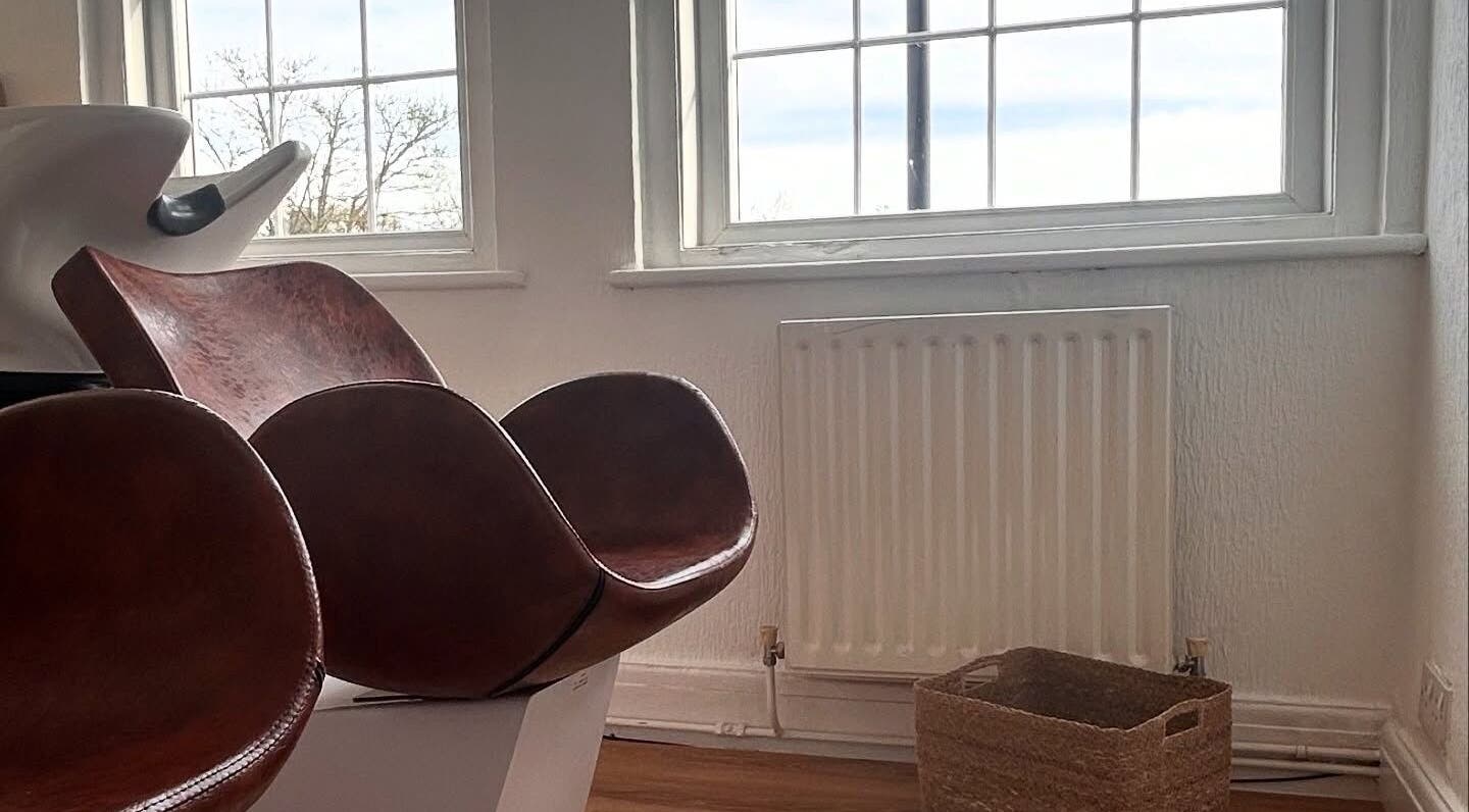 Comfortable seating at Mantra Studio, Leeds, England, GB in a sunlit corner for a tranquil experience.