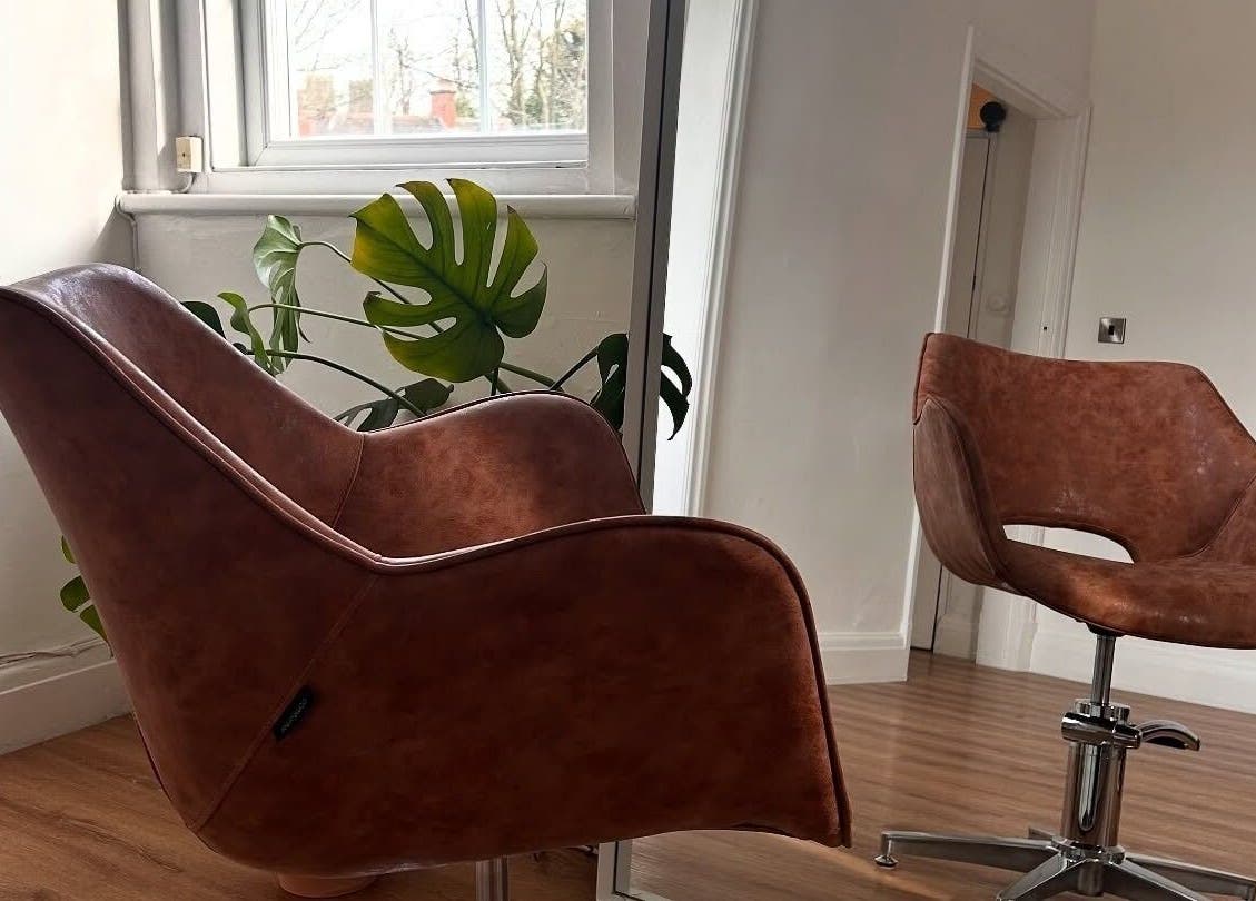 Stylish leather chair at Mantra Studio, Leeds, England, GB, ideal for relaxing wellness sessions.