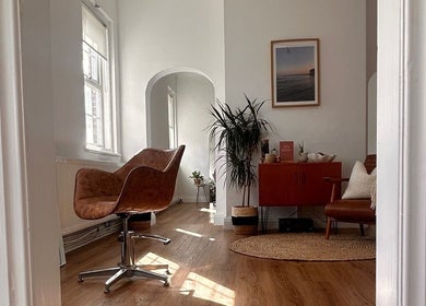 Cozy seating area at Mantra Studio, Leeds, England, GB with natural light and stylish decor.