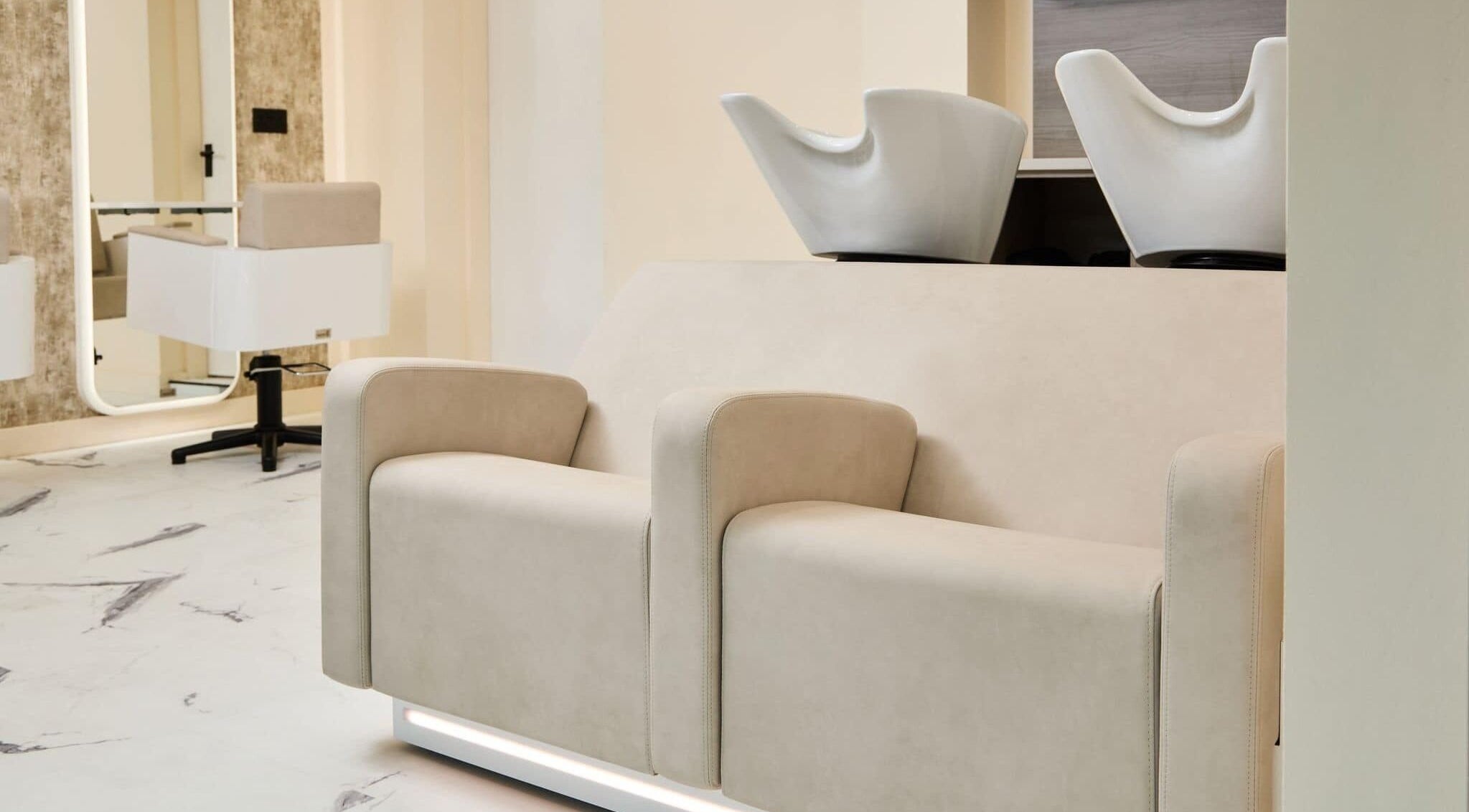 Elegant salon chairs at Alysia Grimshaw Hair, Ramsbottom, England, GB, offering a modern and chic setting.