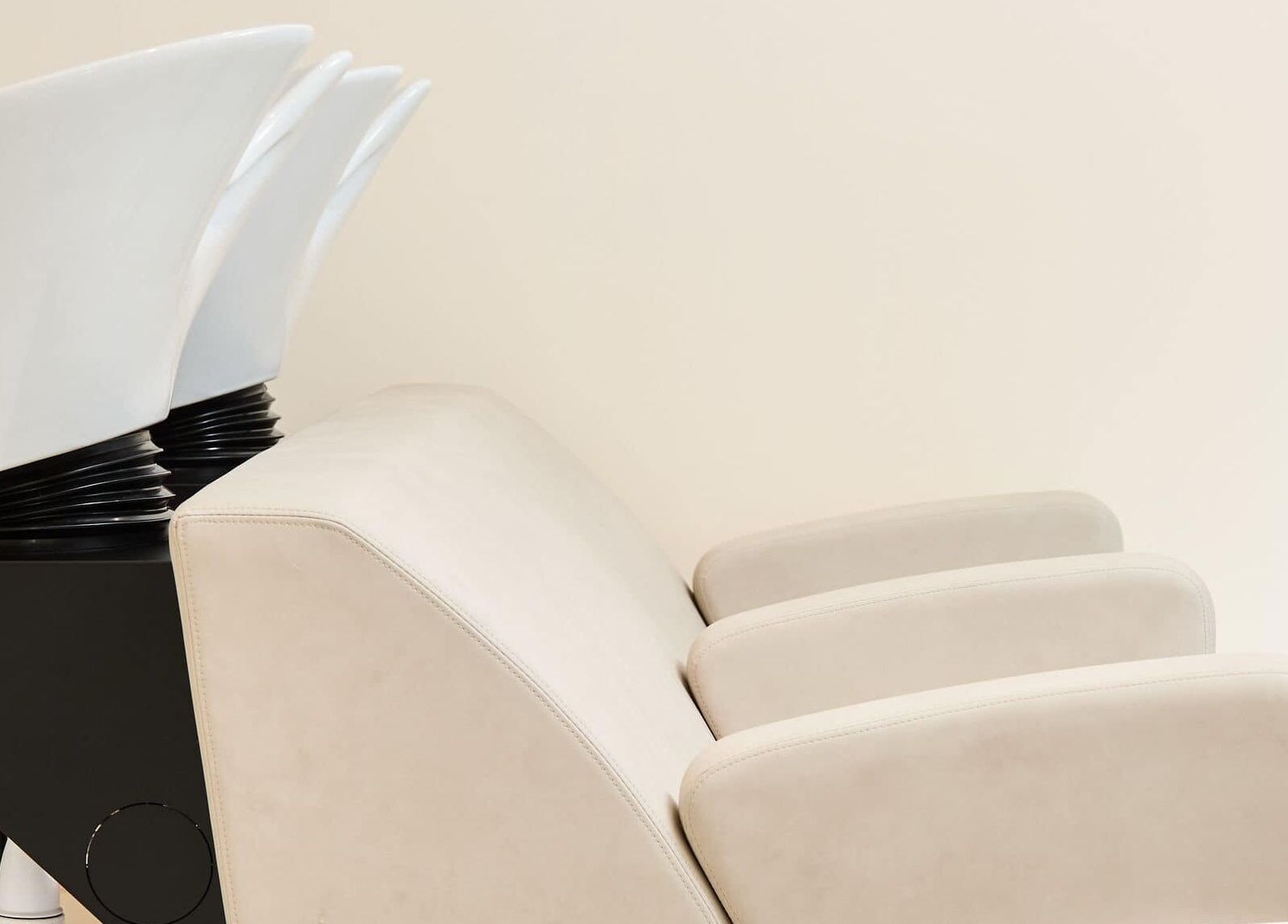 Modern salon wash station at Alysia Grimshaw Hair in Ramsbottom, England, GB, featuring comfortable seating.