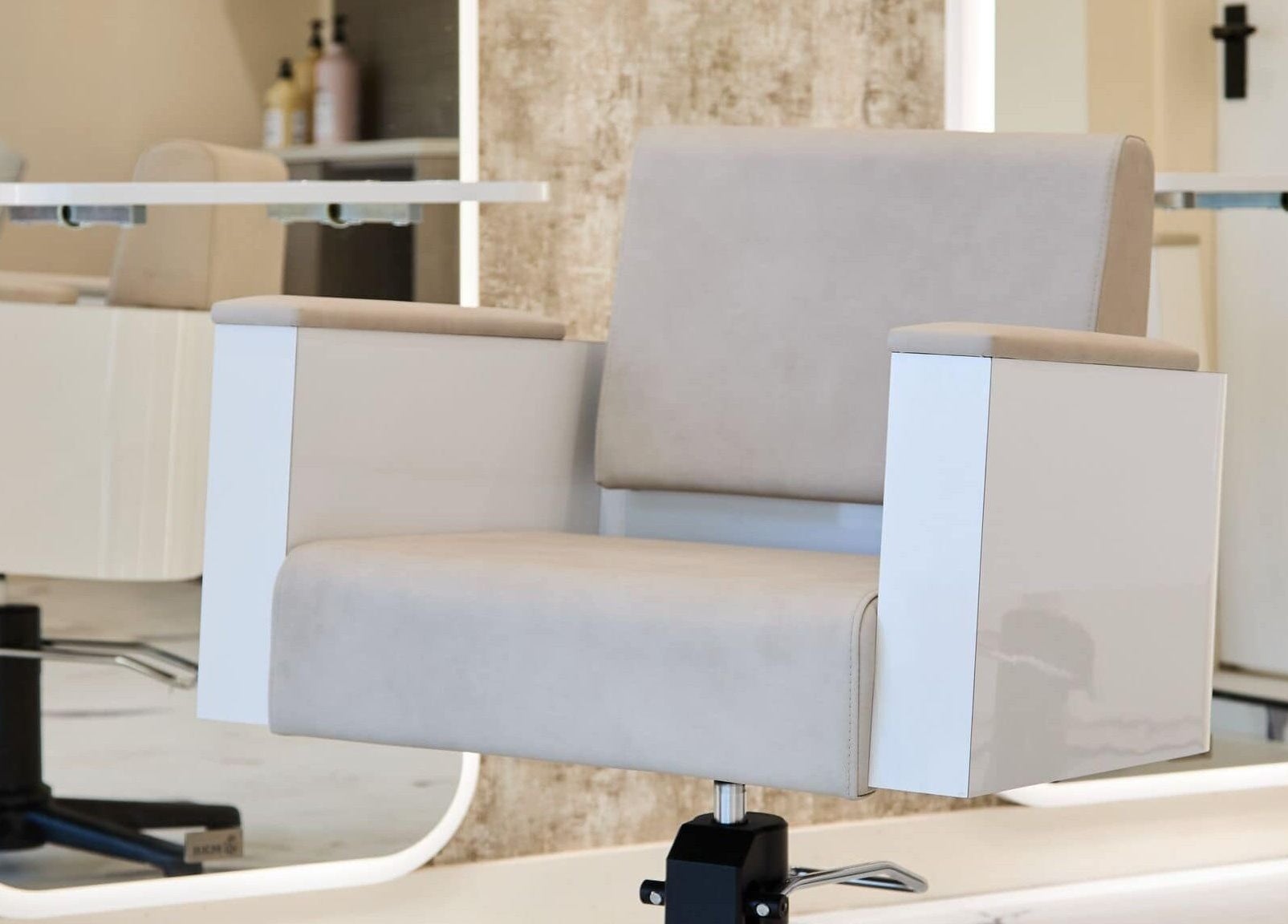 Modern salon chair at Alysia Grimshaw Hair in Ramsbottom, England, GB, offering premium hairstyling services.