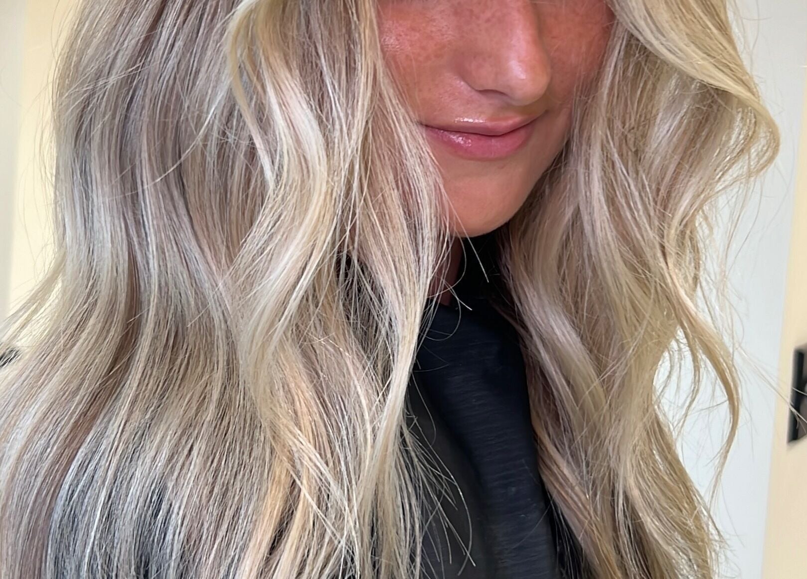 Close-up of styled blonde hair at Alysia Grimshaw Hair in Ramsbottom, England, GB.