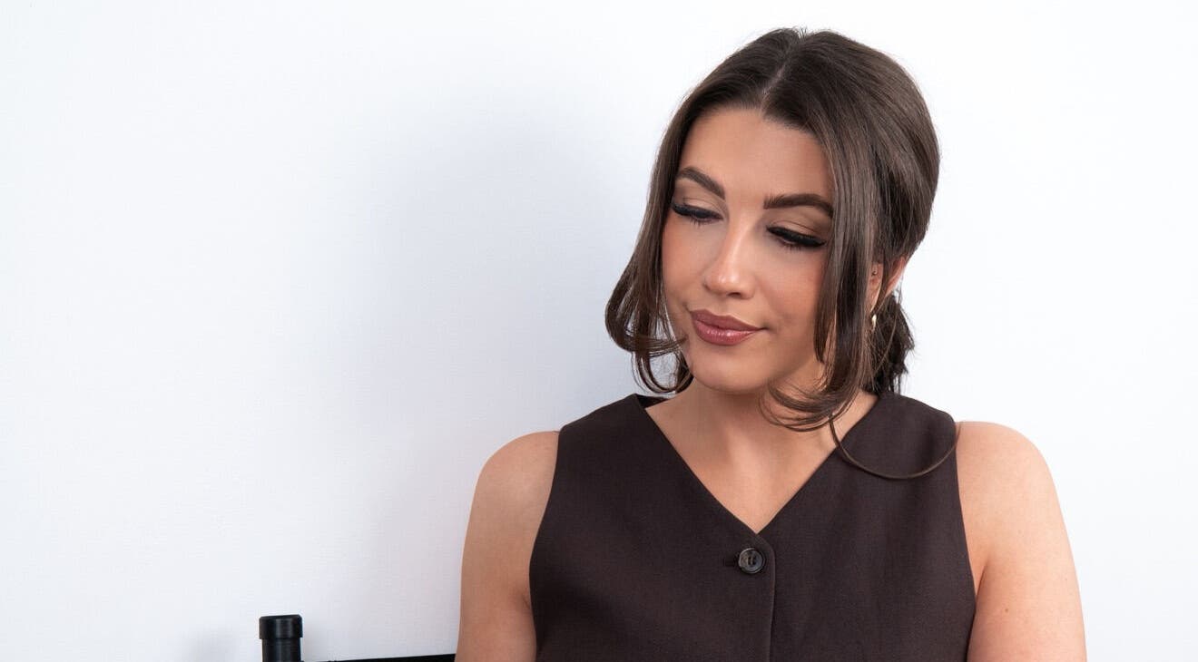 Elegant woman with styled hair at Refined Skin & Beauty, BISHOPS STORTFORD, GB.