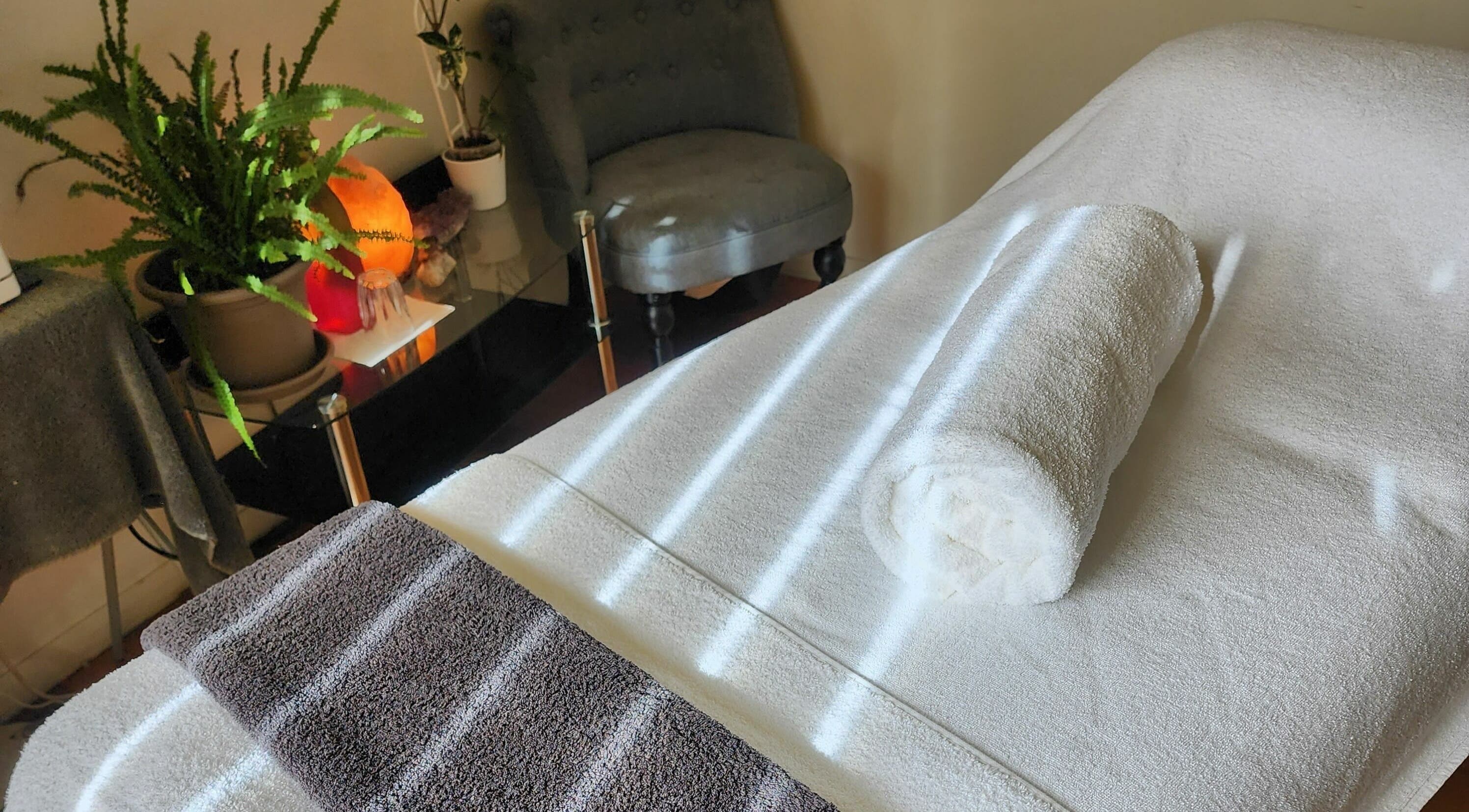 Relaxing massage bed at Soul Haven Face and Body, Shearwater, Tasmania, AU, with cozy ambiance.