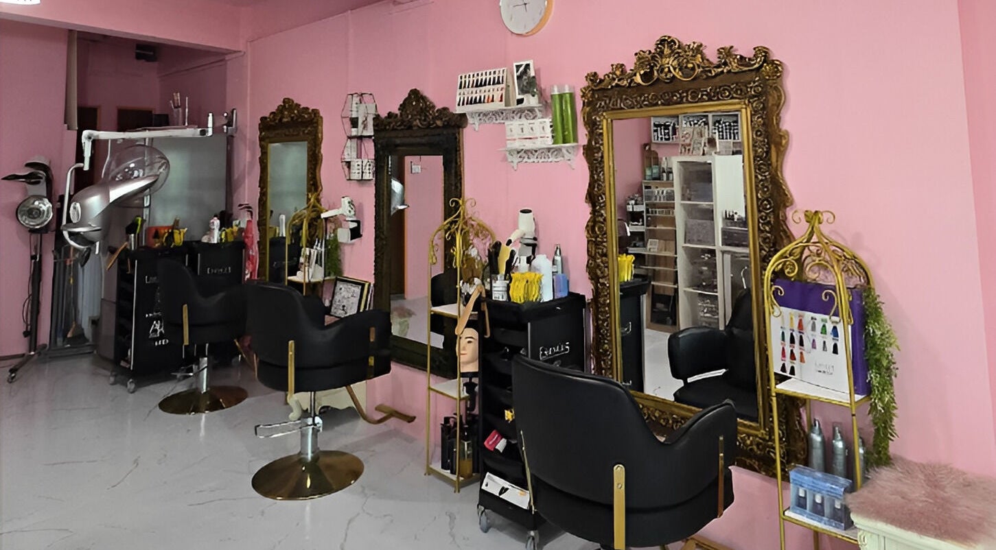 Chic salon interior at Magnifique By Paris Jane - Balestier, Singapore, SG with ornate mirrors and styling chairs.