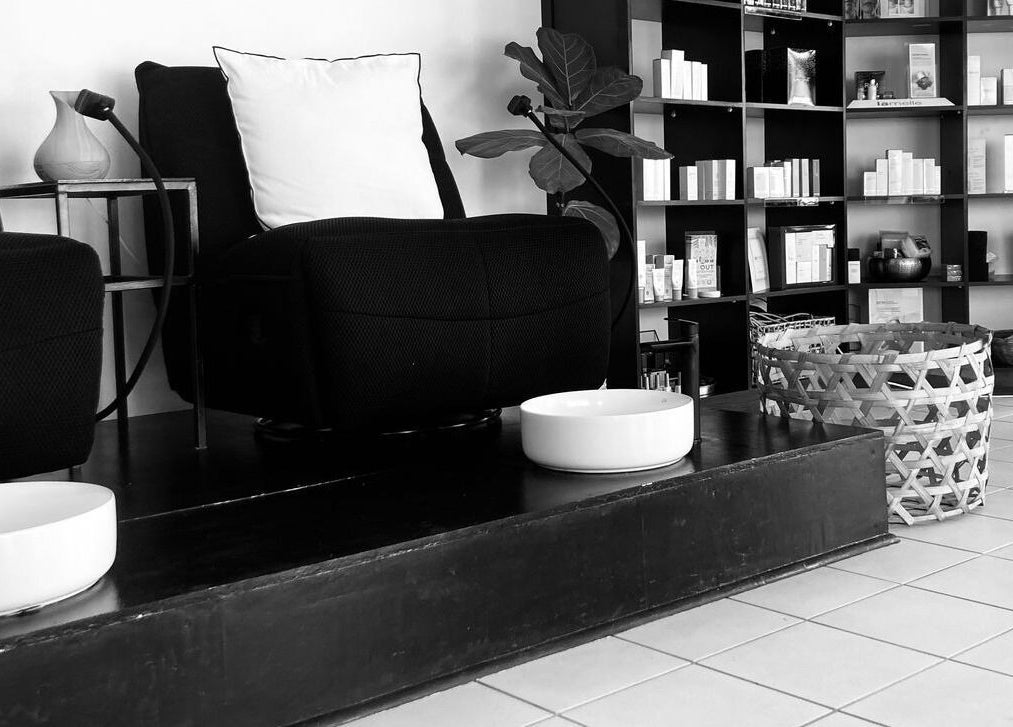 Elegant lounge area at Y & Co. SKIN - HAIR - NAILS in Yzerfontein, Western Cape, ZA with stylish decor.