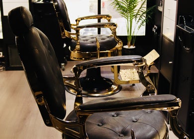 Elegant grooming chairs at Hayre Grooming Salon in Abu Dhabi, Abu Dhabi, AE, offering premium styling services.