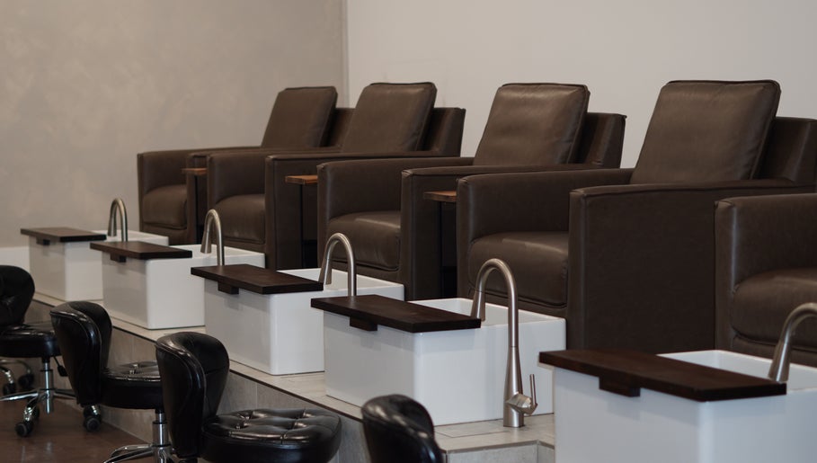 Luxurious pedicure lounge at Brand & Co. in Philadelphia, Pennsylvania, US, featuring plush seating.