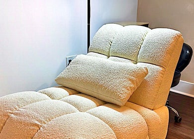 Comfortable lounge chair at Brand & Co., Philadelphia, Pennsylvania, US, perfect for wellness sessions.