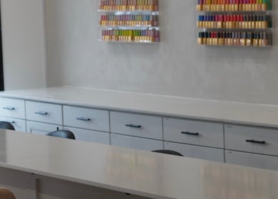 Spacious salon desk with colorful nail polish at Brand & Co., Philadelphia, Pennsylvania, US.