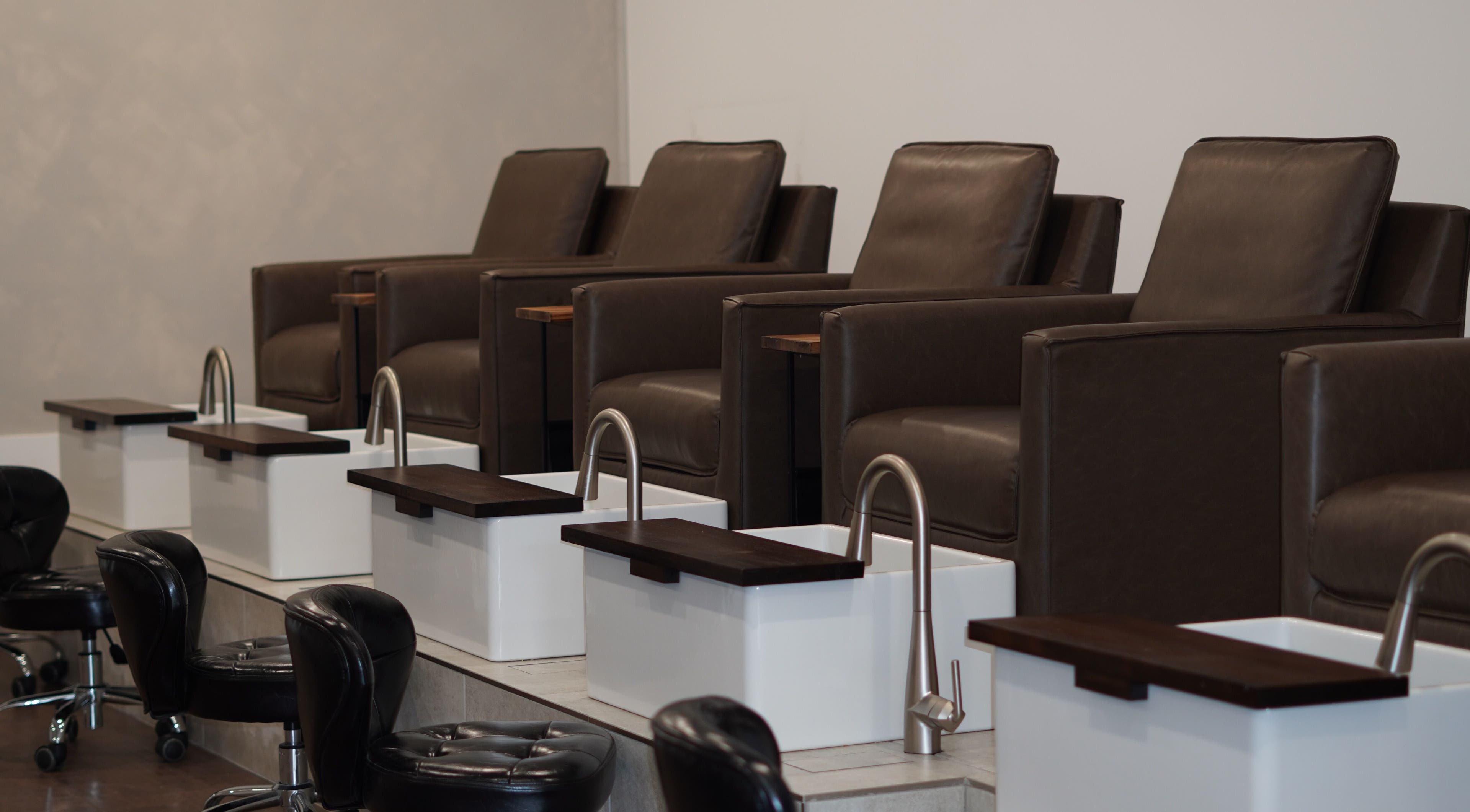 Elegant pedicure chairs at Brand & Co. in Philadelphia, Pennsylvania, US, offering a luxurious spa experience.