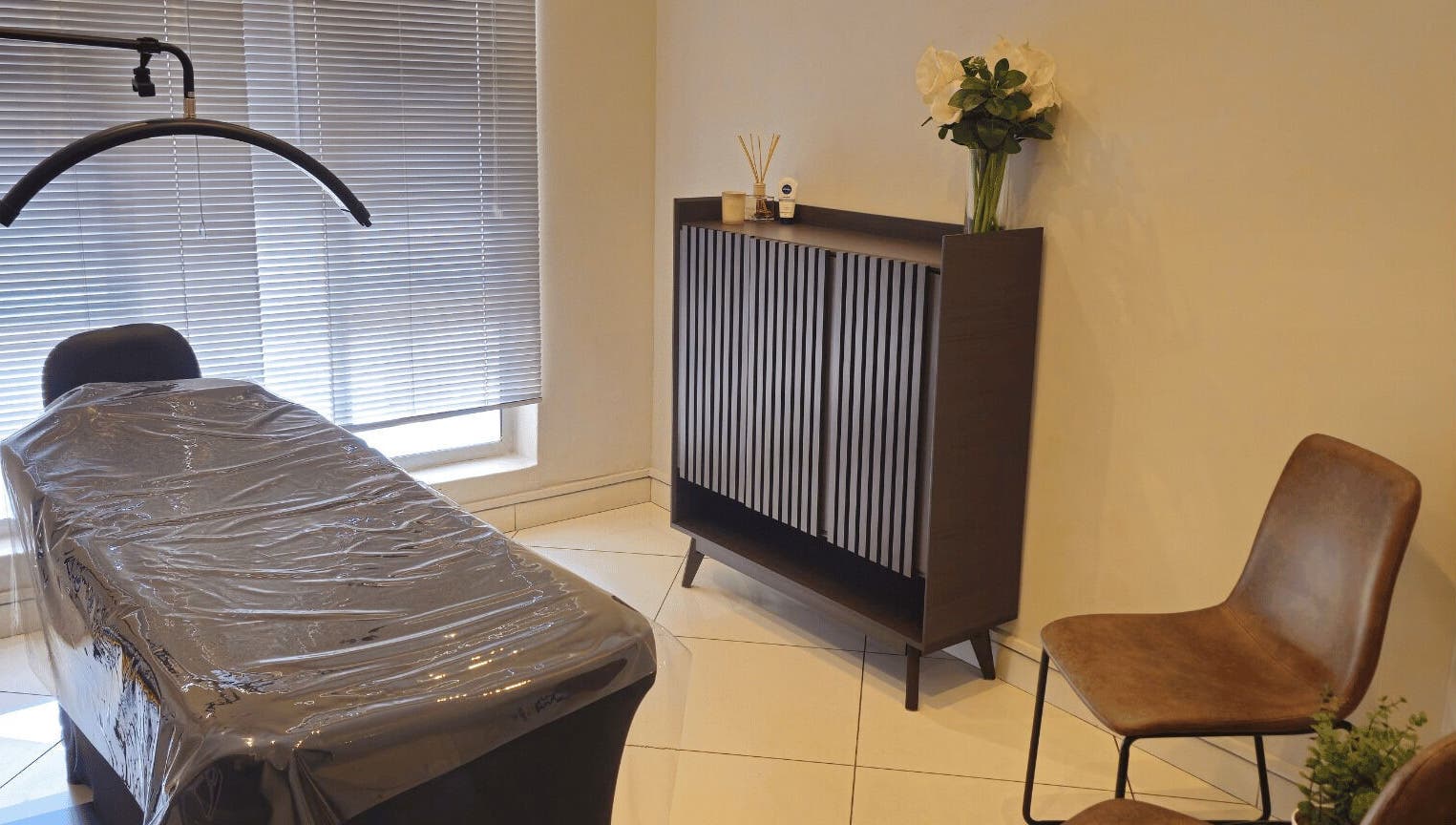 Elegant treatment room at Refined Artistry in Centurion, Gauteng, ZA, featuring a modern design.