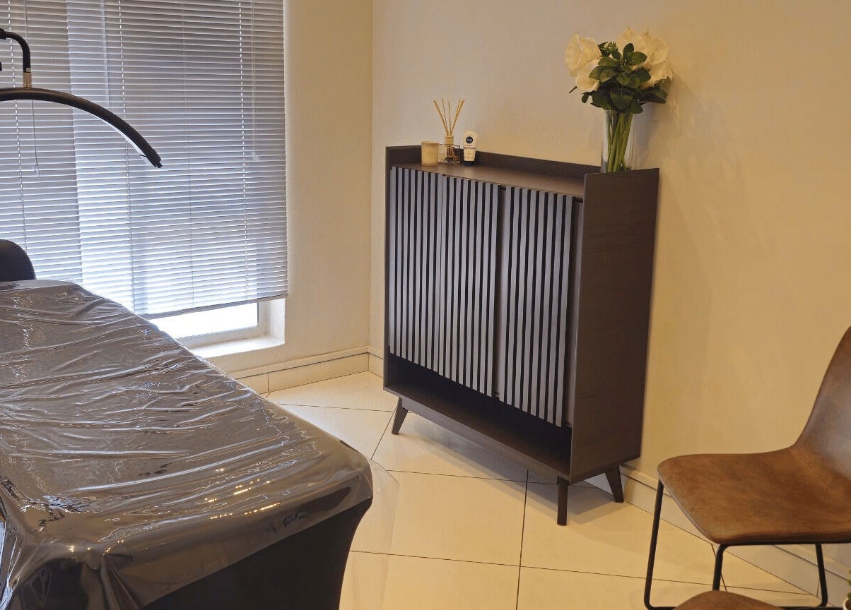 Elegant treatment room at Refined Artistry in Centurion, Gauteng, ZA, featuring a modern design.