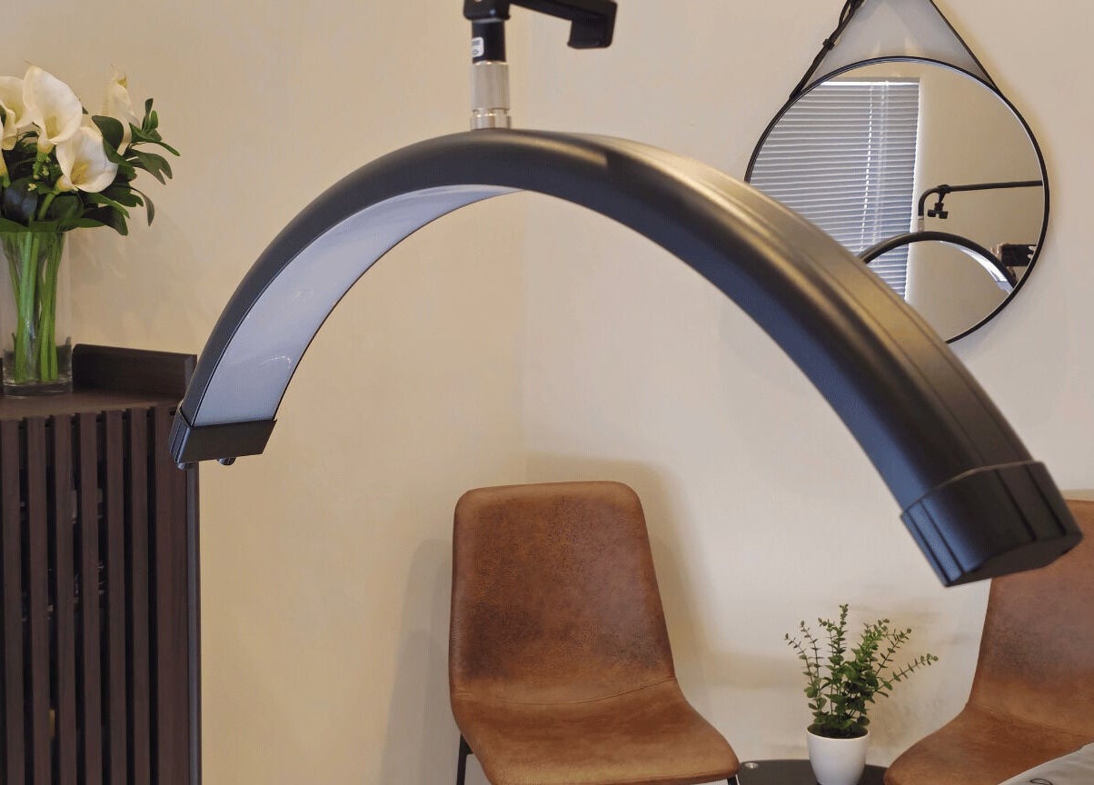 Refined Artistry's tranquil lighting corner in Centurion, Gauteng, ZA, featuring plush chairs and elegant decor.