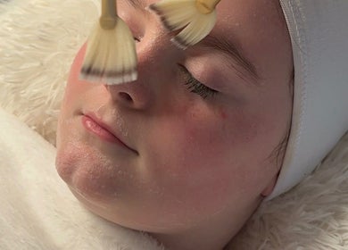 Relaxing facial treatment at taylarmadeskin, Paisley, Scotland, GB, enhancing skin glow and rejuvenation.