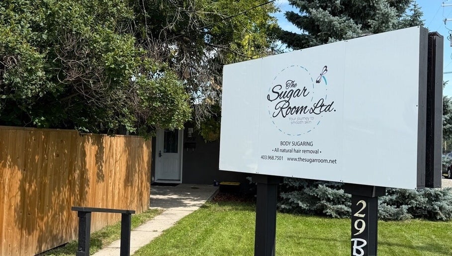 Entrance sign of The Sugar Room Okotoks offering body sugaring in Okotoks, Alberta, CA.