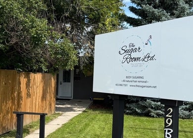 Entrance sign of The Sugar Room Okotoks offering body sugaring in Okotoks, Alberta, CA.