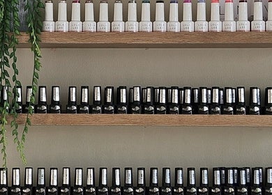Nail polish shelf display at Sj Studio in Durban, Kwazulu-natal, ZA with various vibrant colors.
