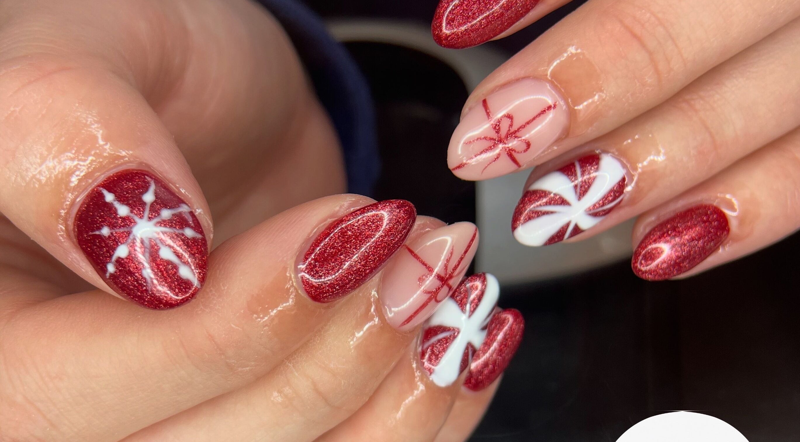 Festive red and white nail art at studio3esthetics in Thunder Bay, Ontario, CA.