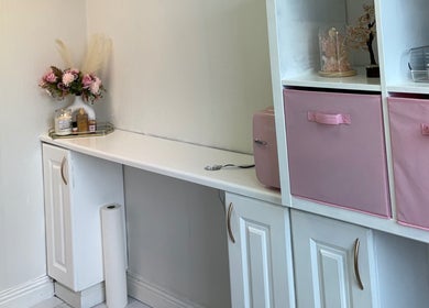 Elegant corner at Better You Aesthetics in Finglas, County Dublin, IE, with pink decor and storage.