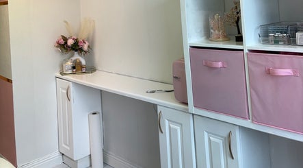 Elegant corner at Better You Aesthetics in Finglas, County Dublin, IE, with pink decor and storage.
