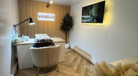 Elegant nail salon interior at Faith Nail'd It, Ebbsfleet Valley, England, GB, featuring modern design elements.