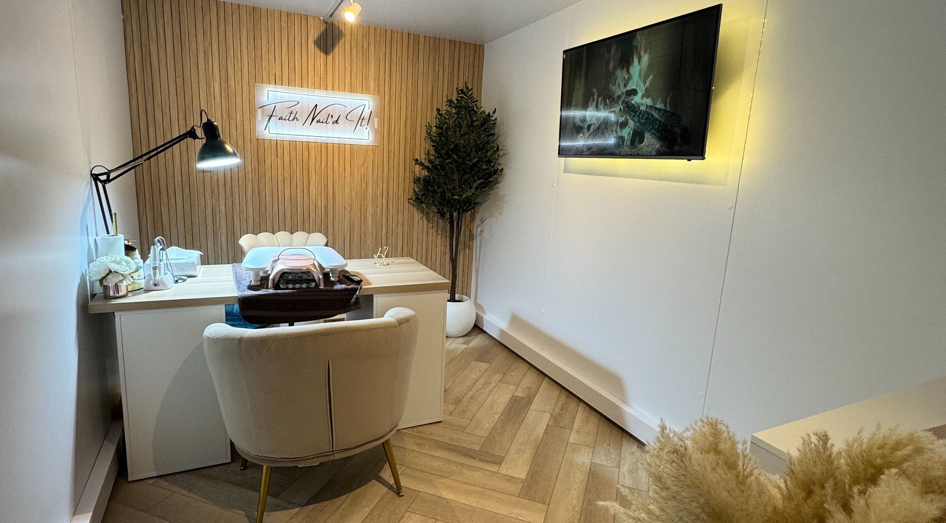 Elegant nail salon interior at Faith Nail'd It, Ebbsfleet Valley, England, GB, featuring modern design elements.