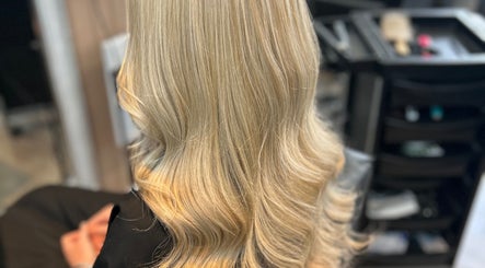 Blonde waves styled at Hair by Ellie, Atherstone, England, GB for a chic and elegant look.