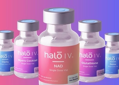 Halo IV bottles at Skin&Medics@Bombshell, Basingstoke offering wellness IV therapies for health.