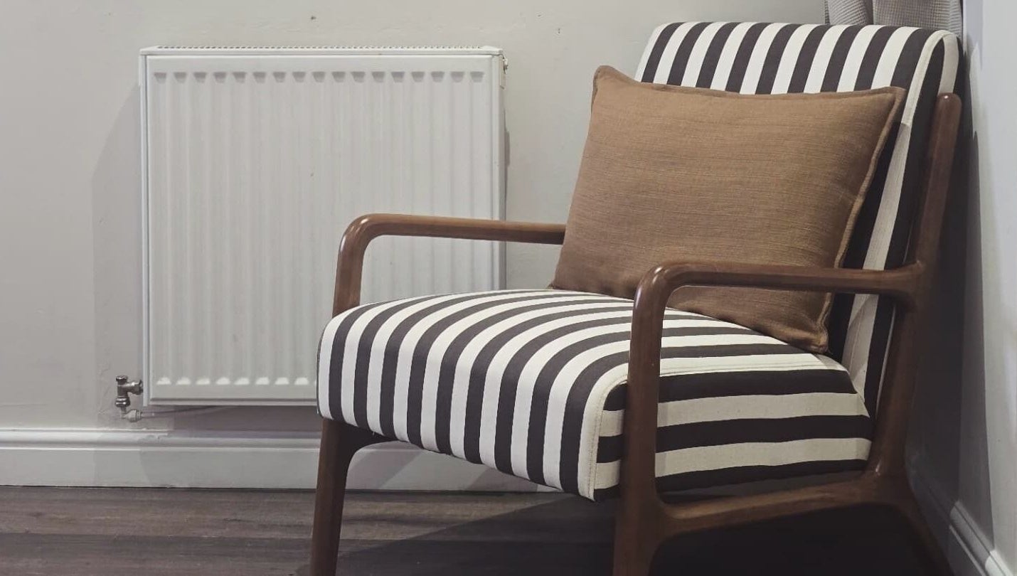 A stylish striped chair with cushion at NOVA by Arlene, Dunfermline, Scotland, GB.