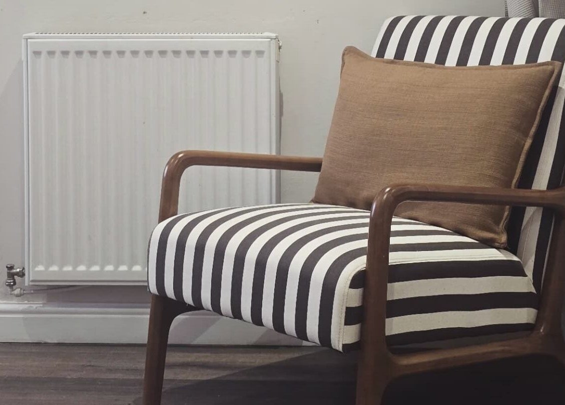 A stylish striped chair with cushion at NOVA by Arlene, Dunfermline, Scotland, GB.