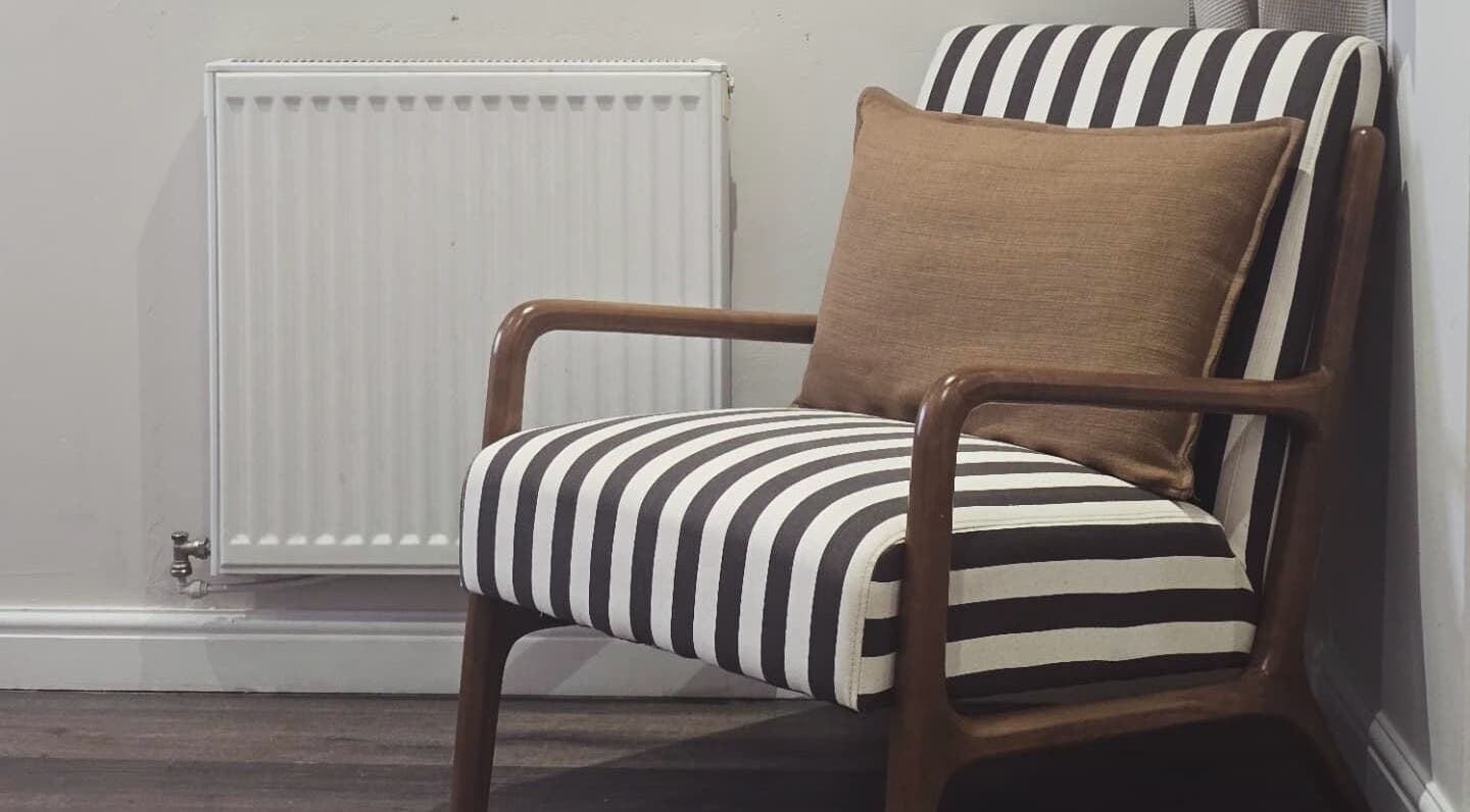 A stylish striped chair with cushion at NOVA by Arlene, Dunfermline, Scotland, GB.