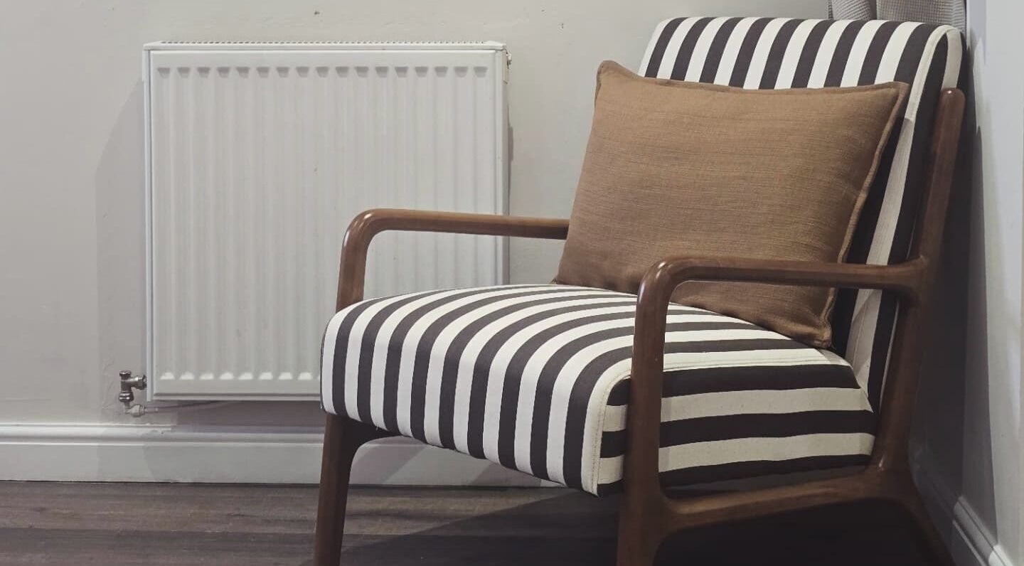 A stylish striped chair with cushion at NOVA by Arlene, Dunfermline, Scotland, GB.