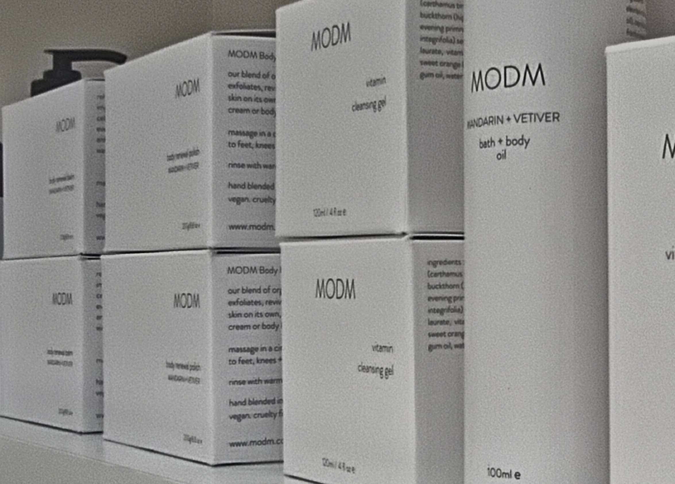 A shelf with MODM skincare products at NOVA by Arlene, Dunfermline, Scotland, GB.