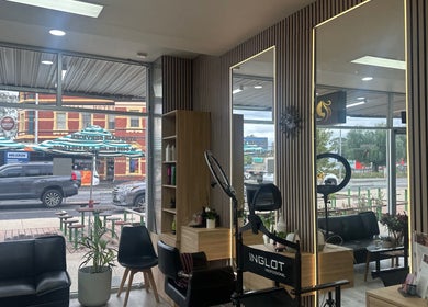 Modern interior of Star Hair and Beauty in Melbourne, Victoria, AU showcasing stylish salon chairs and decor.