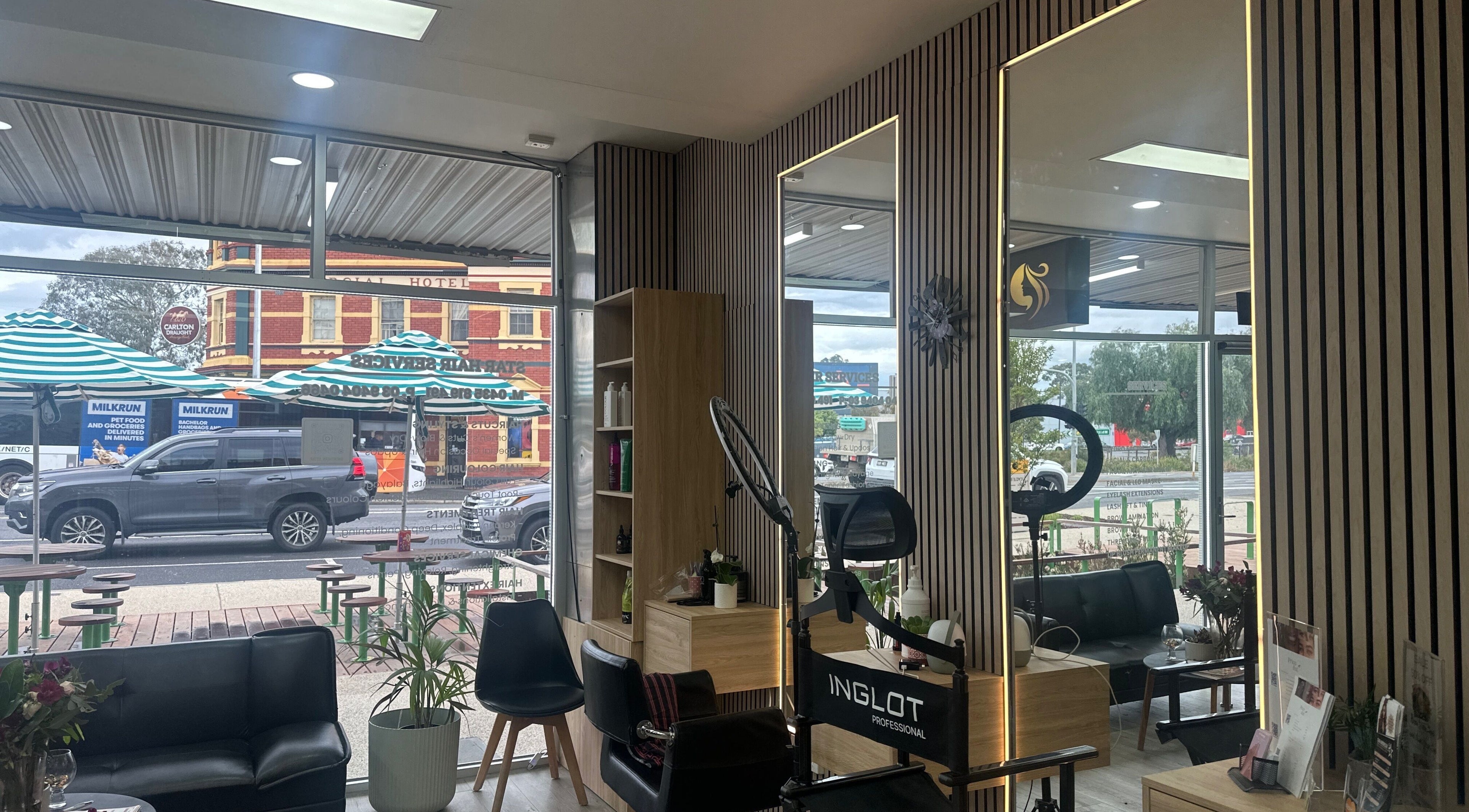 Modern interior of Star Hair and Beauty in Melbourne, Victoria, AU showcasing stylish salon chairs and decor.