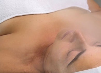 Relaxing facial treatment at X&O Beauty Co, Melbourne, Victoria, AU, showcasing a serene client experience.