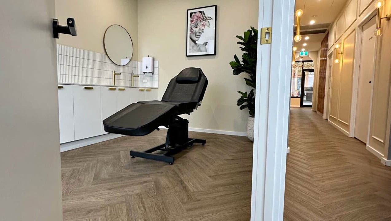 Modern treatment room at ROXBURGH PARK, Melbourne, Victoria, AU with sleek furnishings and elegant decor.