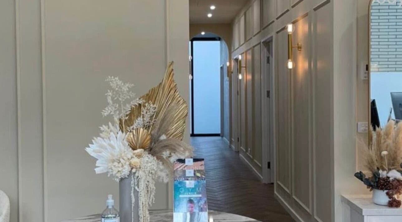 Elegant hallway at ROXBURGH PARK in Melbourne, Victoria, AU with chic decor and ambient lighting.