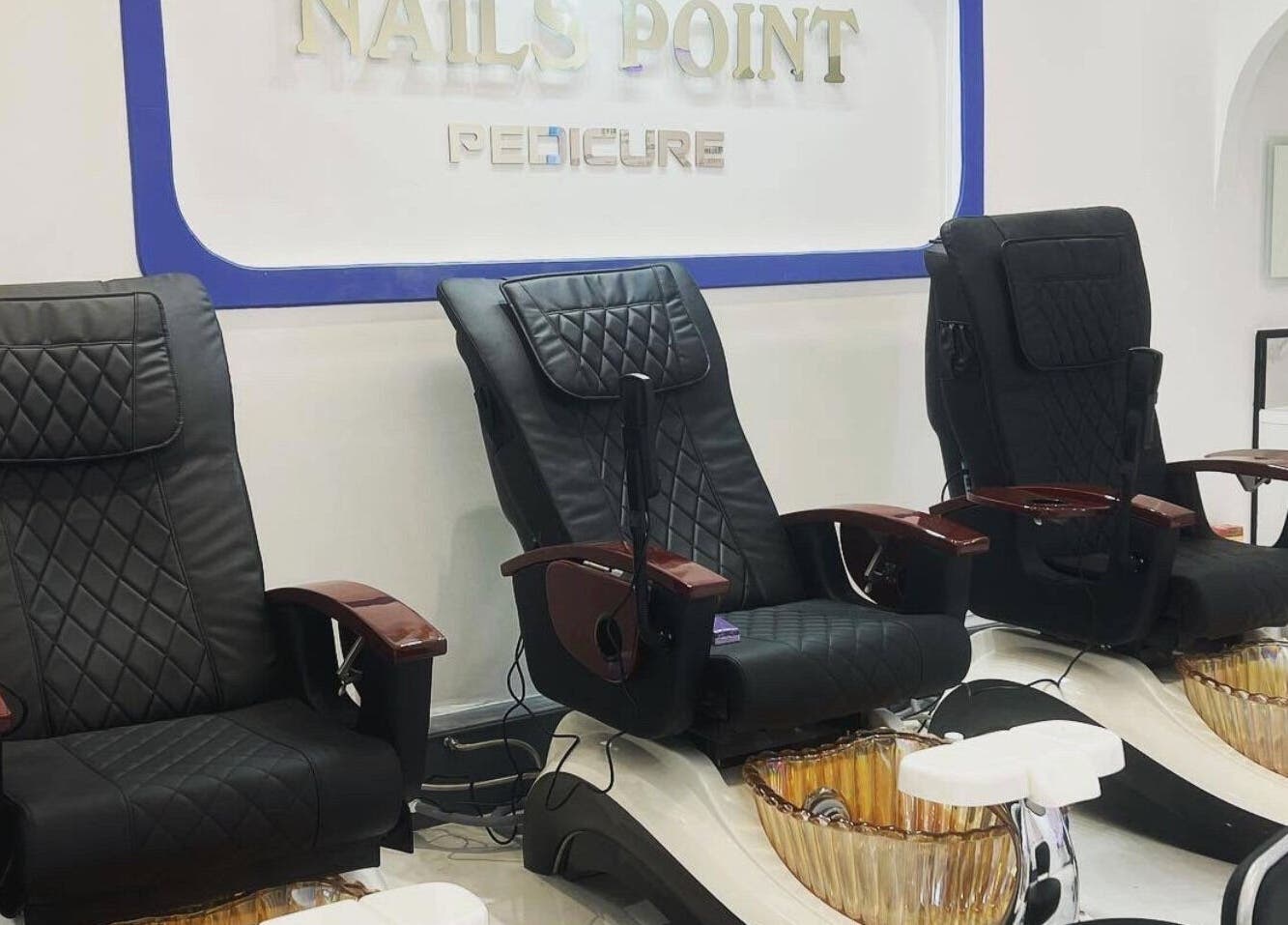 Luxurious pedicure chairs at Nails Point in London, England, GB offering premium wellness services.