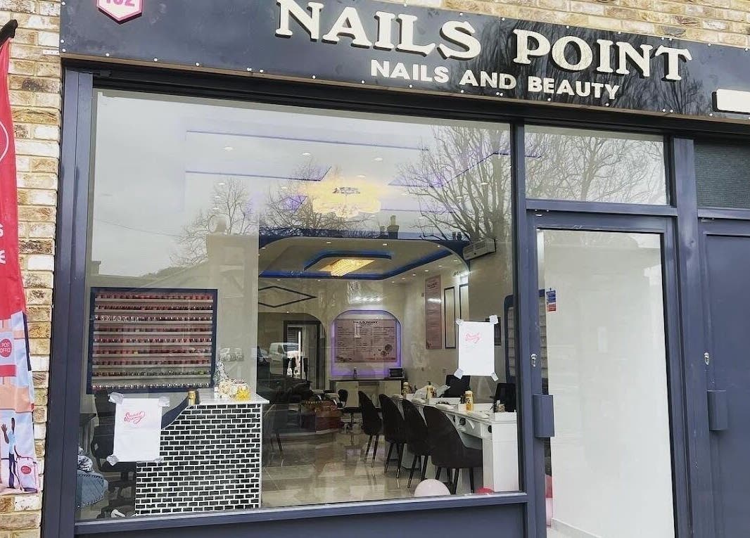 Exterior view of Nails Point, a nail salon in London, England, GB, showcasing its inviting entrance.