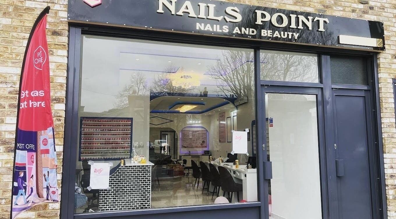 Exterior view of Nails Point, a nail salon in London, England, GB, showcasing its inviting entrance.
