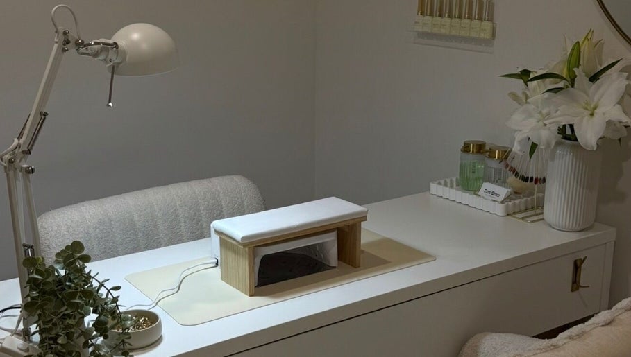 A tranquil nail care station at Mashed Nails in Melbourne, Victoria, AU, adorned with plants and elegant decor.