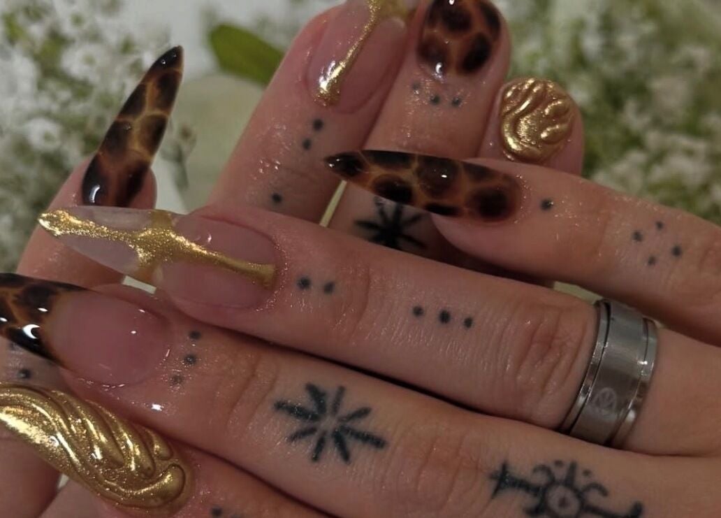 Intricate nail art with gold details at Mashed Nails, Melbourne, Victoria, AU.