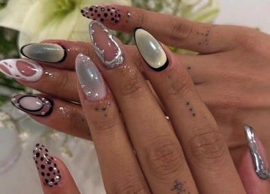 Artistic nail designs at Mashed Nails, Melbourne, Victoria, AU showcasing unique patterns and textures.