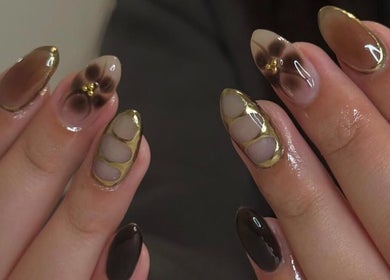 Stunning golden nail art design at Mashed Nails, Melbourne, Victoria, AU, showcasing elegance and trend.