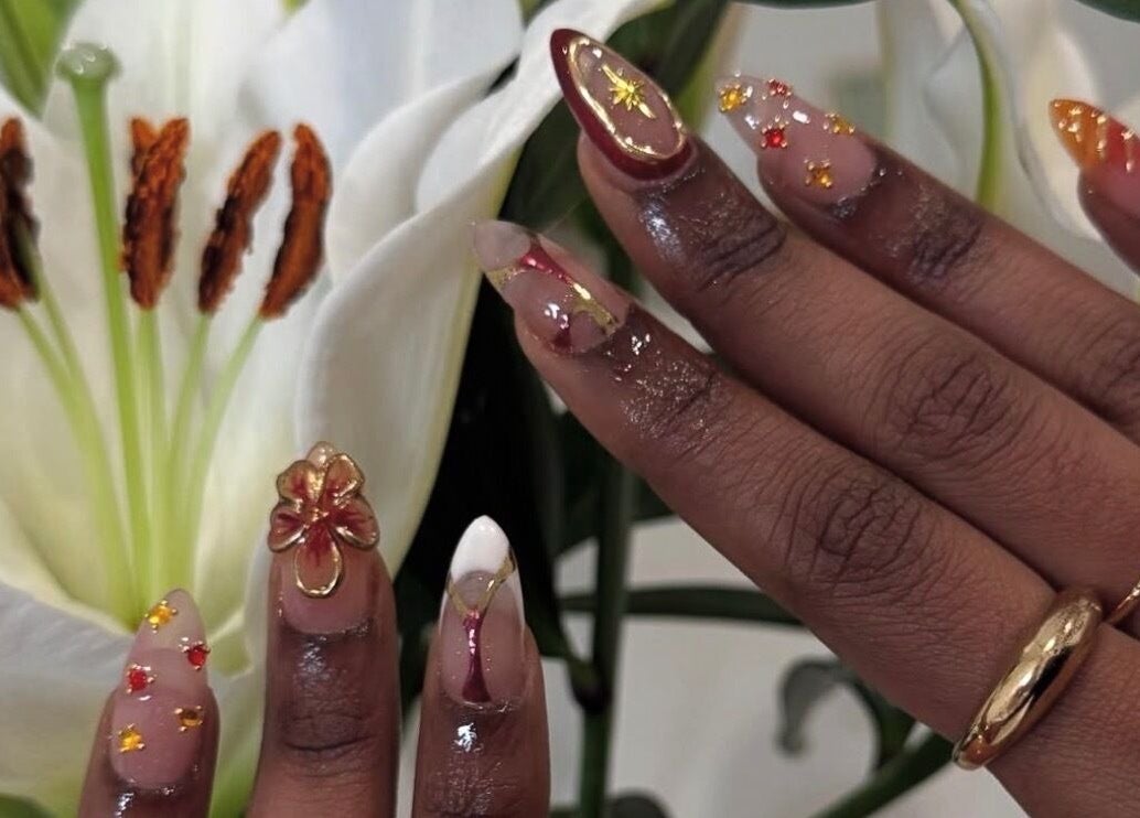 Elegant floral nail art at Mashed Nails, Melbourne, Victoria, AU, showcasing intricate designs and vibrant colors.